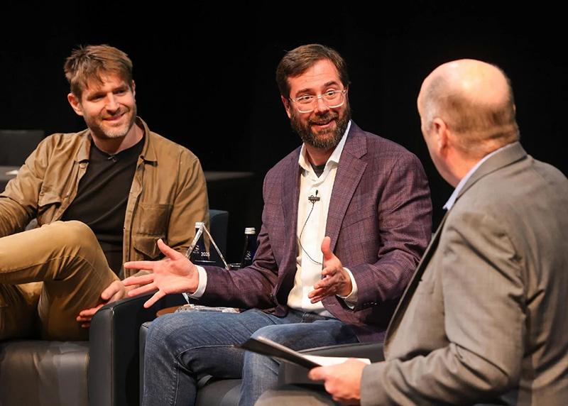 Two winners of the Entrepreneur of the Year participate in a discussion with President Schmidt